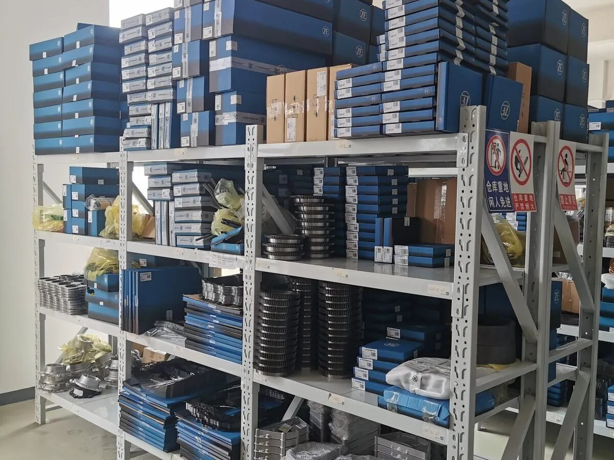 Boxed transmission parts on warehouse shelves